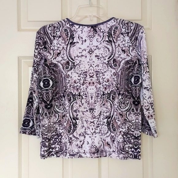 NWOT. Cotton Rayon Spandex Top with multi color patterns and 3/4 sleeves. - Picture 2 of 3